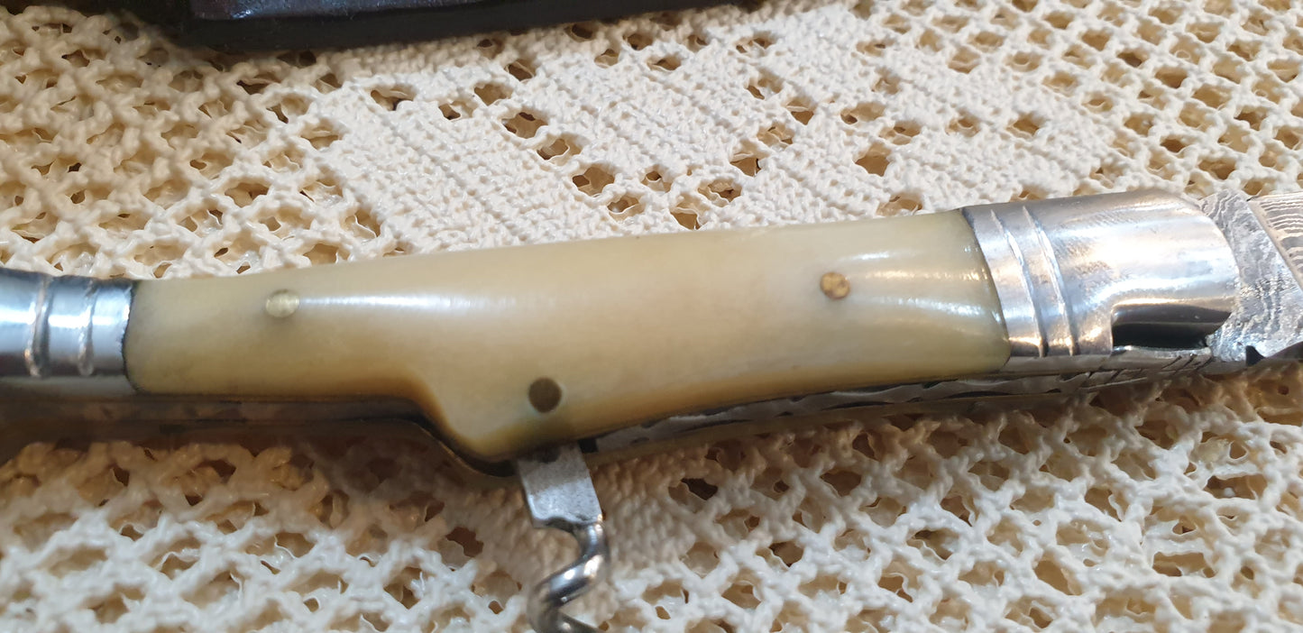 Masterfully Handcrafted Foldable Damascus Knife with Integrated Corkscrew - A Blend of Elegance and Utility