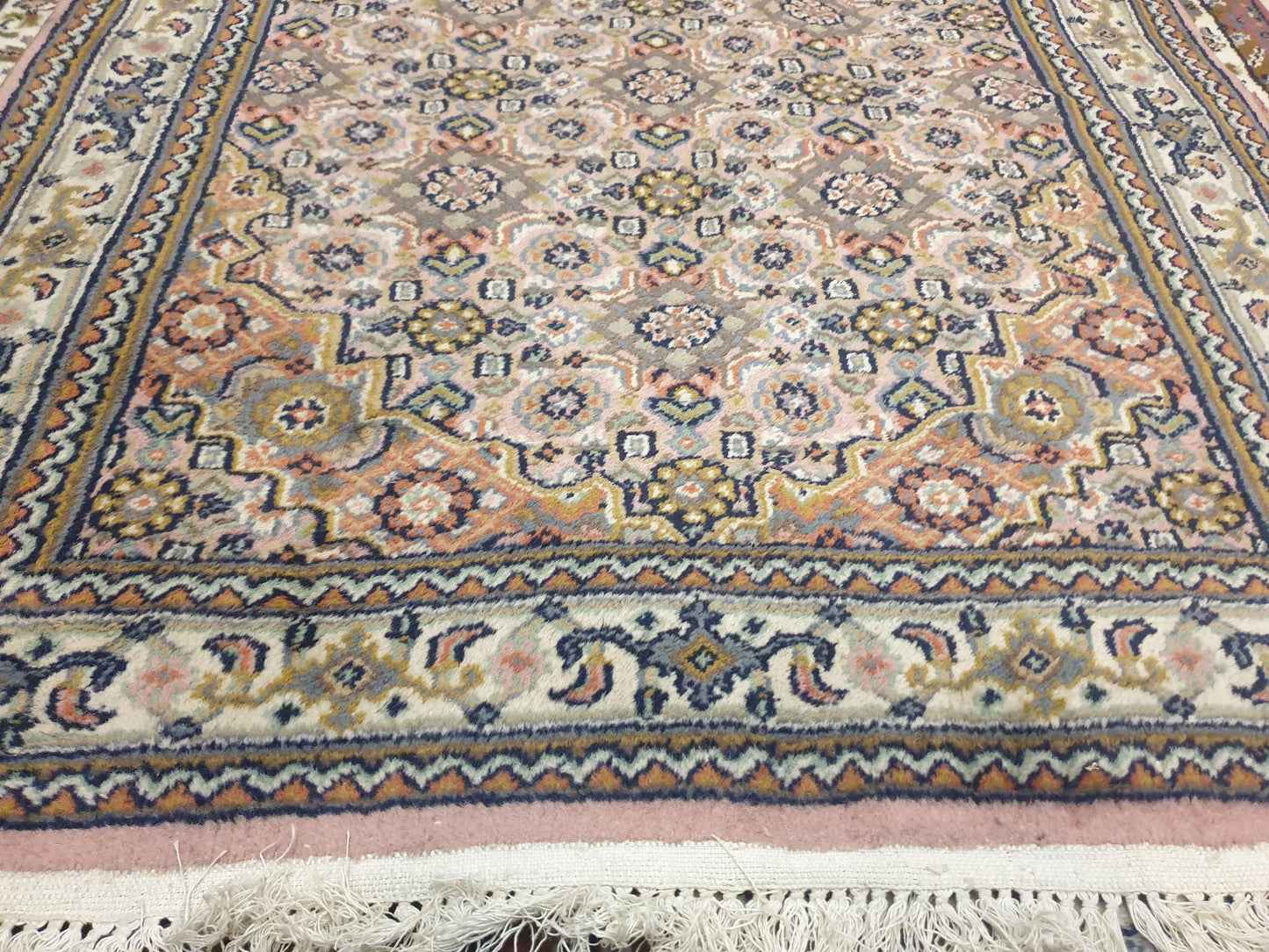 Elegant 5' x 3.4' Hand-Knotted Indo-Persian Carpet.